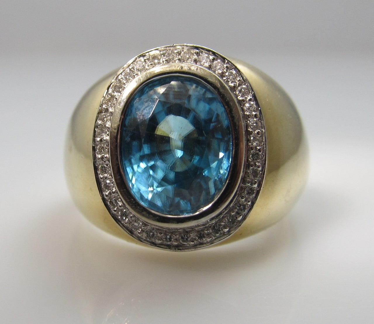 Modern Estate 14k Ring With A 5.00ct Blue Zircon And .20cts In Diamonds