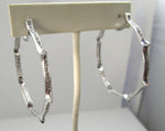 18k white gold hoop earrings with 2cts in diamonds