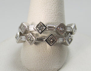 14k White Gold Ring With .85cts In Princess And Baguette Cut Diamonds.