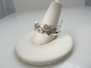 14k White Gold Ring With .85cts In Princess And Baguette Cut Diamonds.