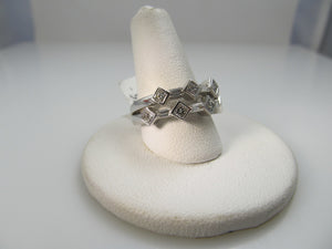 14k White Gold Ring With .85cts In Princess And Baguette Cut Diamonds.