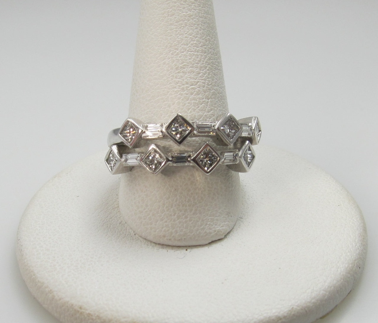14k White Gold Ring With .85cts In Princess And Baguette Cut Diamonds.
