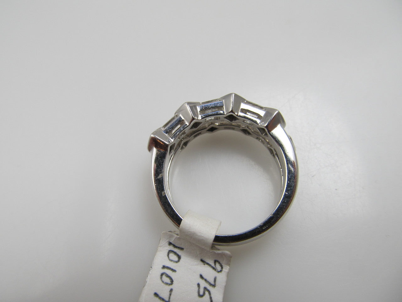 14k White Gold Ring With .85cts In Princess And Baguette Cut Diamonds.