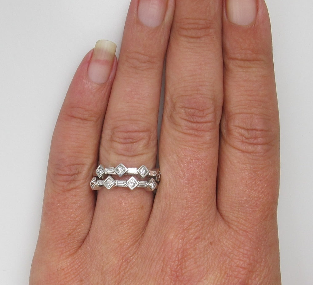 14k White Gold Ring With .85cts In Princess And Baguette Cut Diamonds.