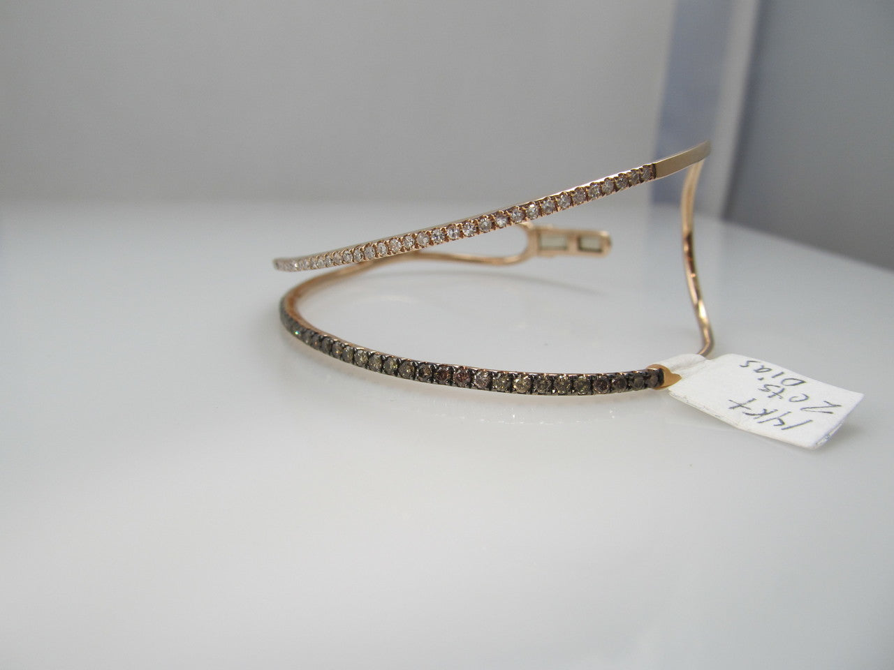 14k rose gold bracelet with 2cts in white and brown diamonds, signed Sofia