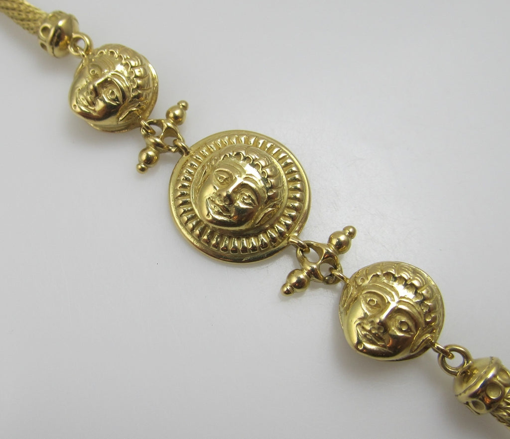 18k yellow gold bracelet with faces