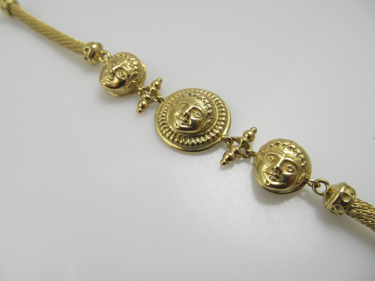 18k yellow gold bracelet with faces