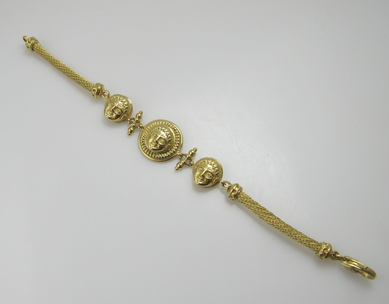 18k yellow gold bracelet with faces