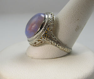 14k White Gold Filigree Ring With A 5.50ct Opal, Circa 1920