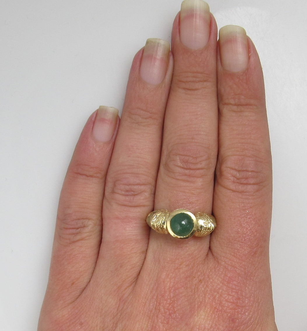 14k Yellow Gold Emerald Ring With Faces