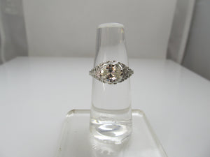 18k White Gold Filigree Ring With A 1.21ct Oval Cut Diamond, Circa 1920