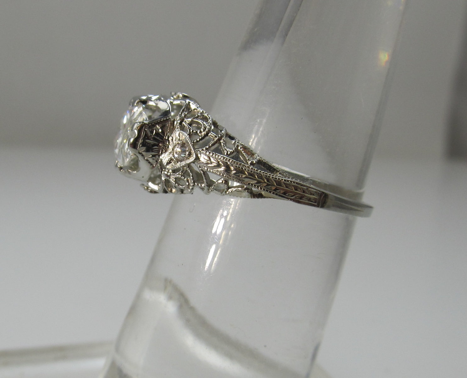 18k White Gold Filigree Ring With A 1.21ct Oval Cut Diamond, Circa 1920