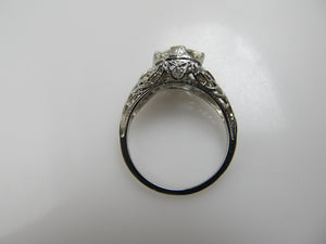 18k White Gold Filigree Ring With A 1.21ct Oval Cut Diamond, Circa 1920