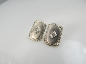 14k and platinum earrings with .20cts in diamonds, circa 1920.