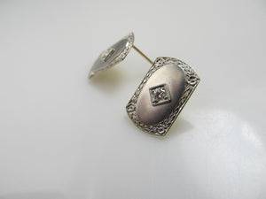 14k and platinum earrings with .20cts in diamonds, circa 1920.