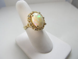 Huge 7.00ct opal ring with diamonds