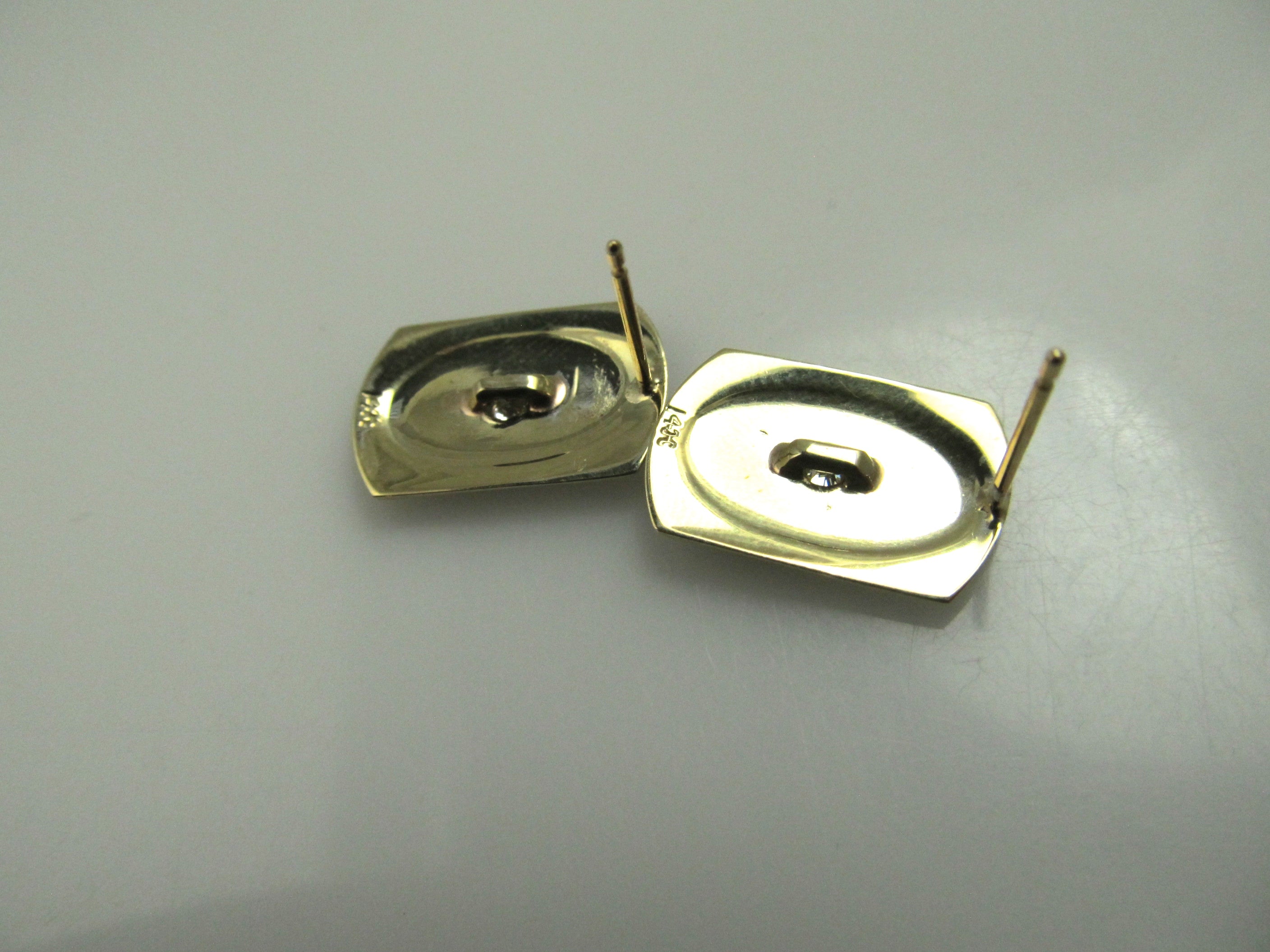 14k and platinum earrings with .20cts in diamonds, circa 1920.
