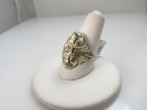 18k white gold filigree ring with a .20ct diamond, circa 1920