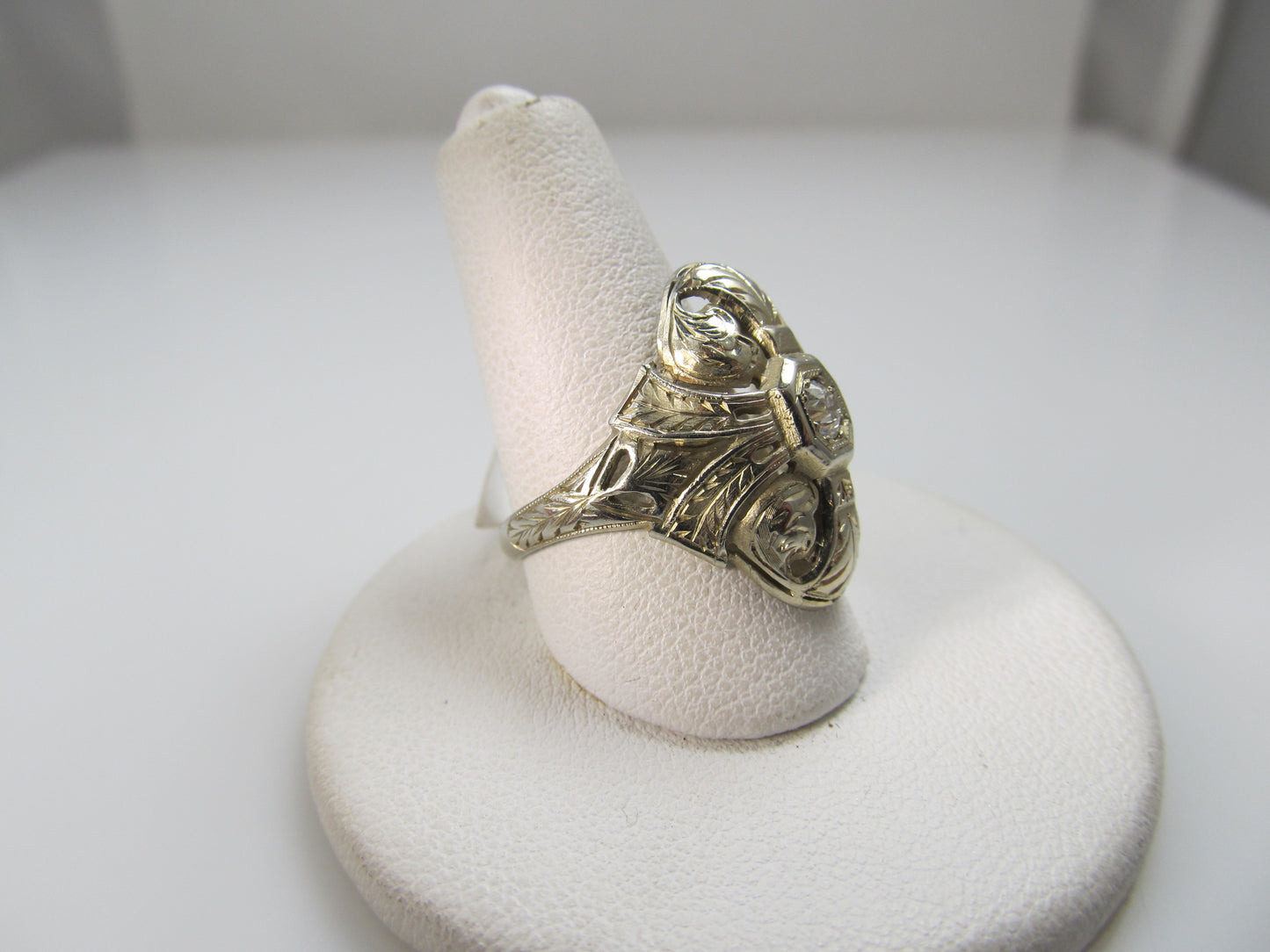 18k white gold filigree ring with a .20ct diamond, circa 1920