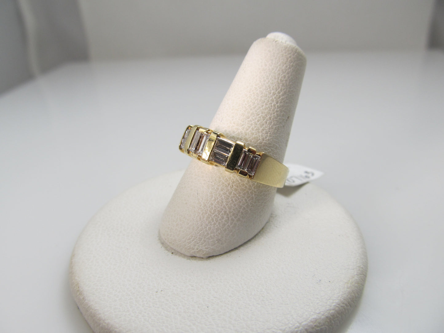 14k yellow gold ring with .70cts in baguette cut diamonds