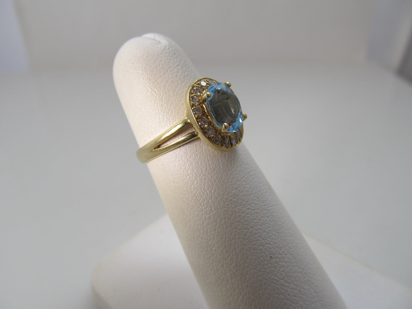 Blue topaz diamond halo ring