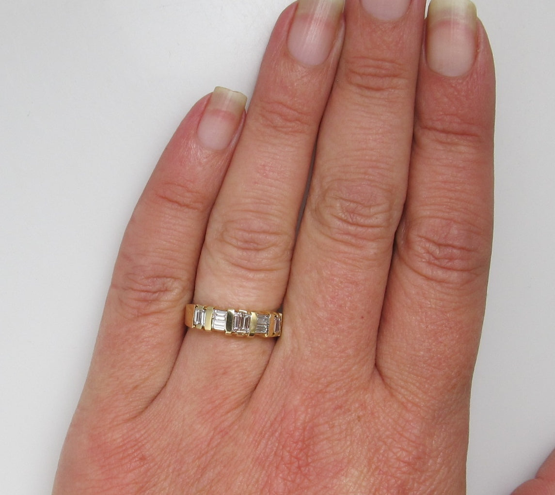 14k yellow gold ring with .70cts in baguette cut diamonds