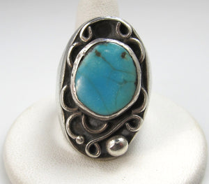 Heavy vintage sterling silver turquoise ring