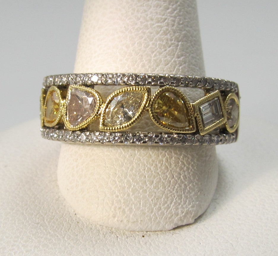 18k white gold band, 1.50ct in fancy yellow diamonds