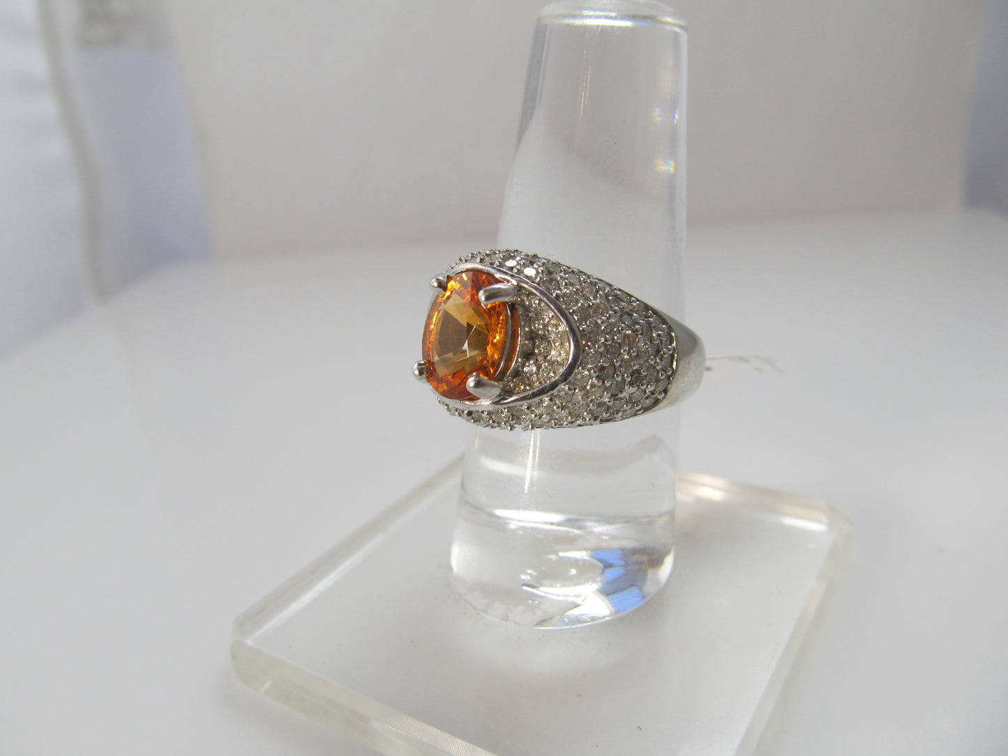 Bright orange natural sapphire diamond ring