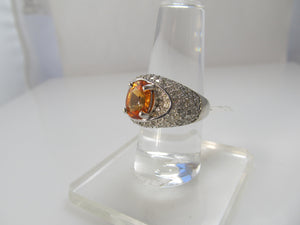 Bright orange natural sapphire diamond ring