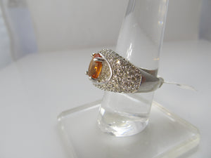 Bright orange natural sapphire diamond ring