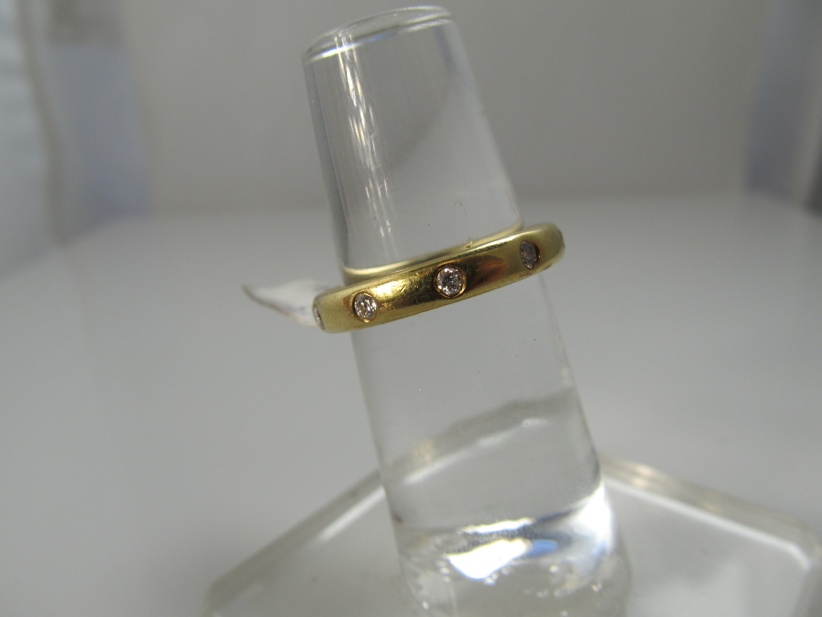 18k flush set diamond band
