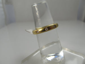 18k flush set diamond band