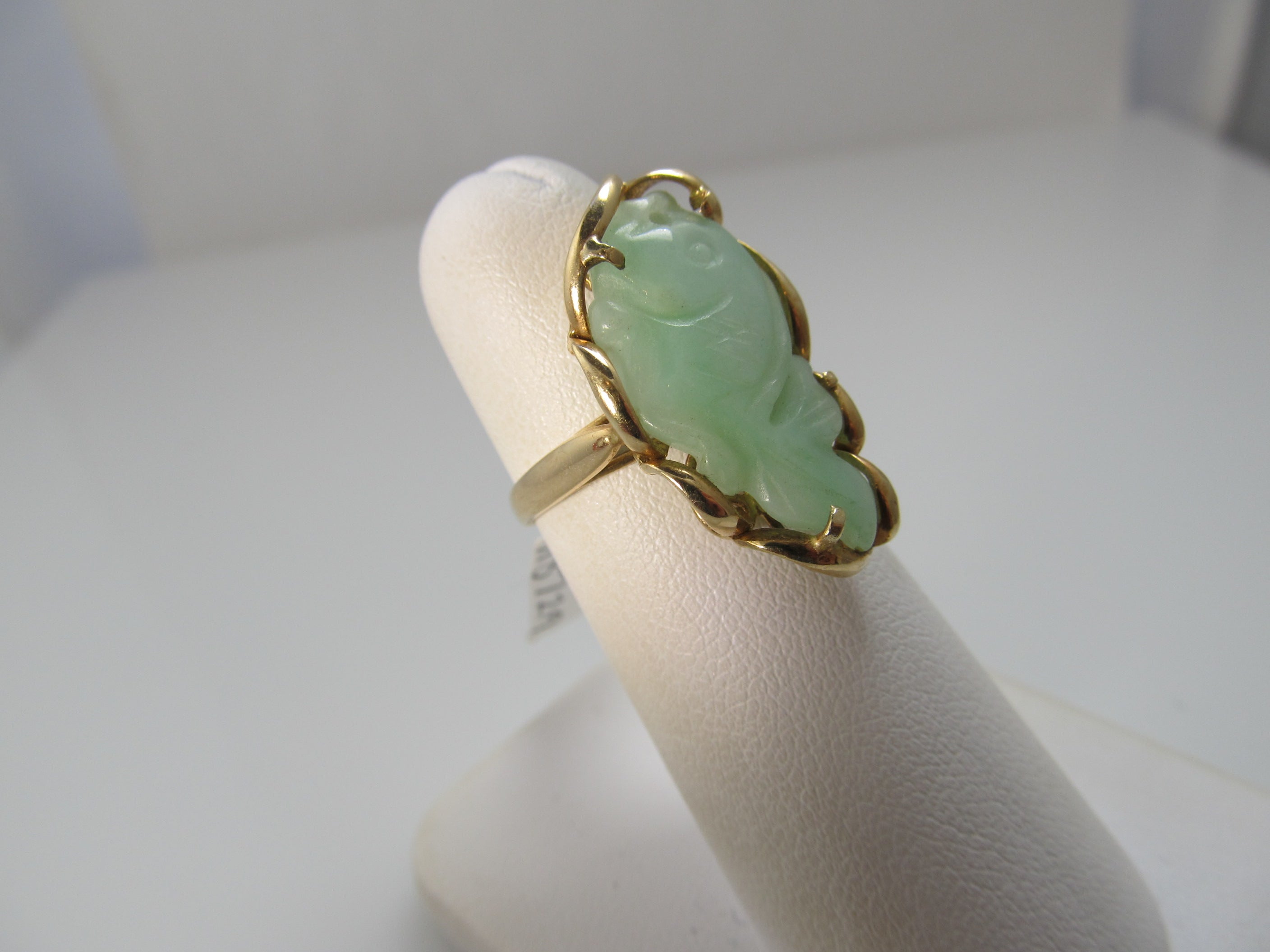 Neat carved jade fish ring