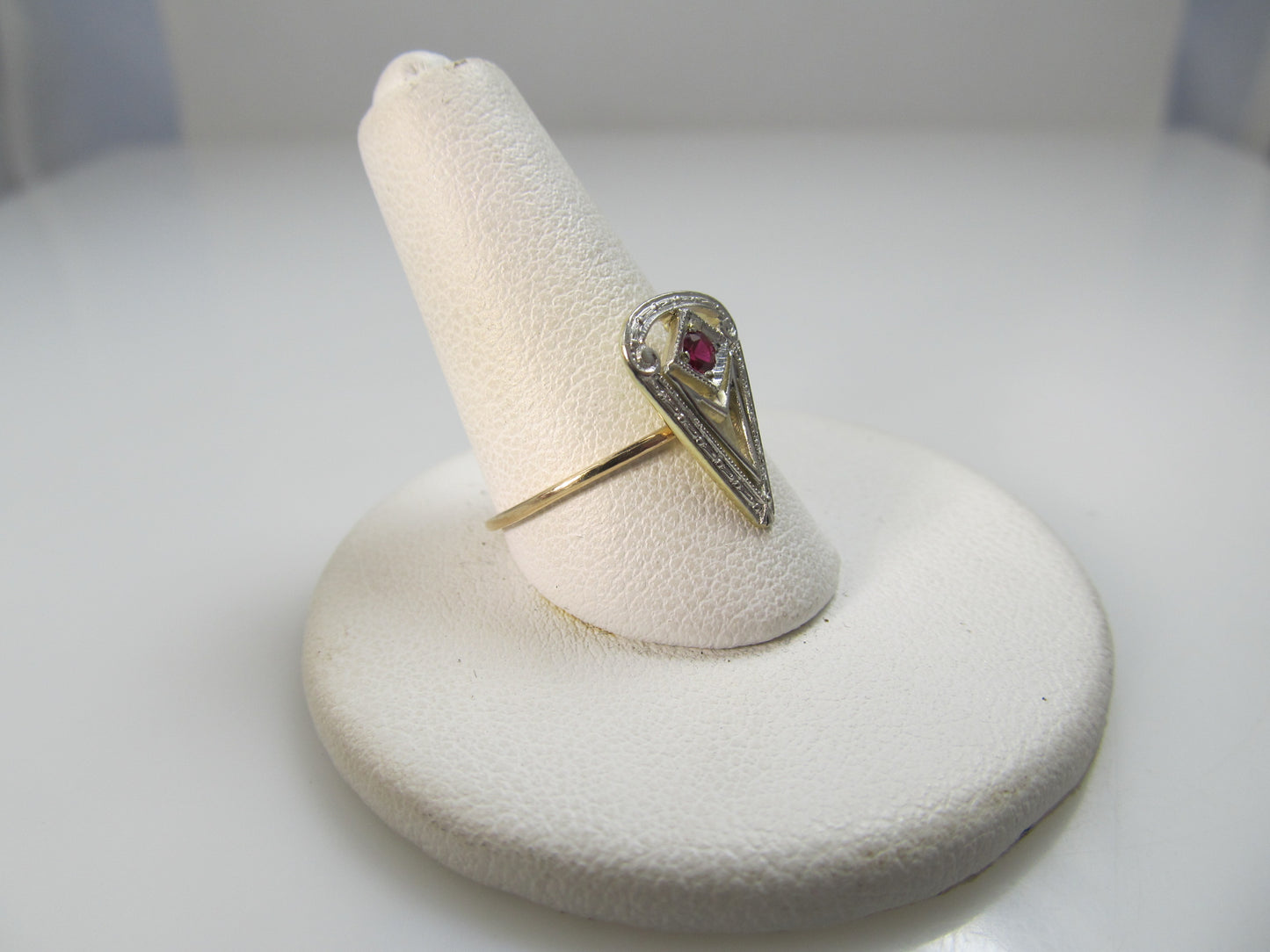 14k white and yellow gold filigree ring with a ruby, circa 1920