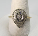 14k white and yellow gold filigree ring with a .10ct diamond, circa 1920.