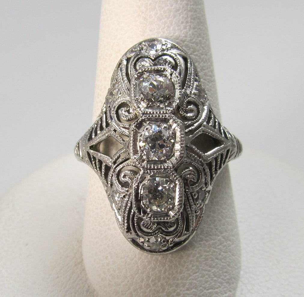 Platinum & 18k long filigree ring with .50cts in diamonds, circa 1920