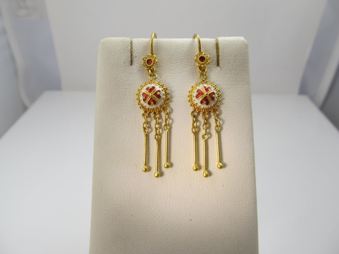 22k gold earrings with red and white enamel