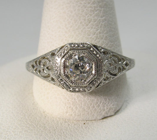 Antique platinum 18K filigree diamond engagement ring