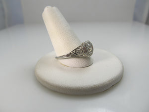 Antique platinum 18K filigree diamond engagement ring