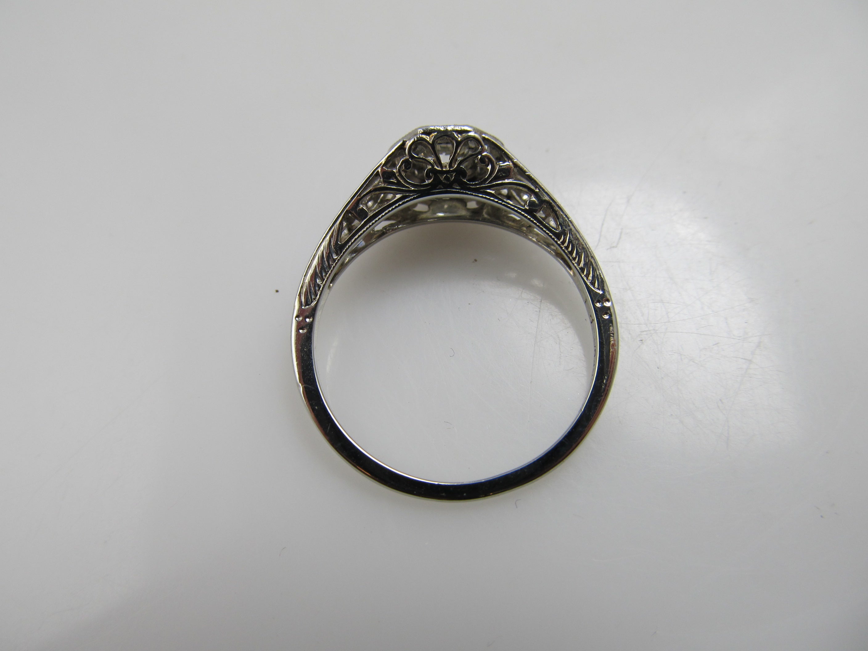 Antique platinum 18K filigree diamond engagement ring