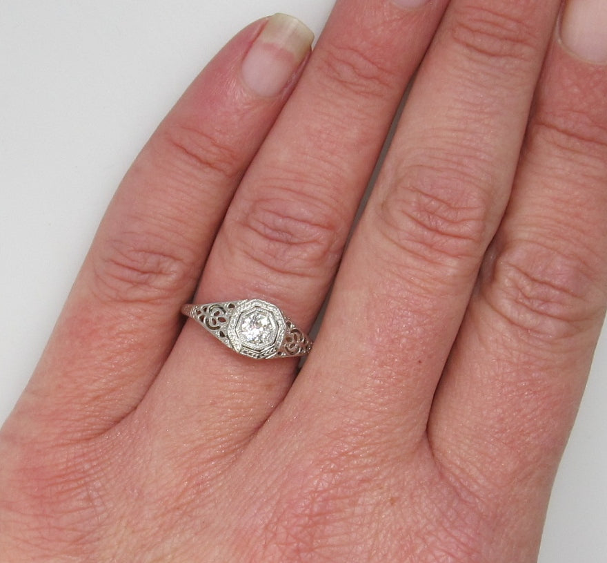 Antique platinum 18K filigree diamond engagement ring