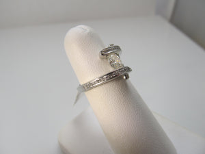 Handmade modernist oval diamond ring