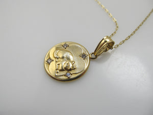 Yellow gold diamond cat necklace