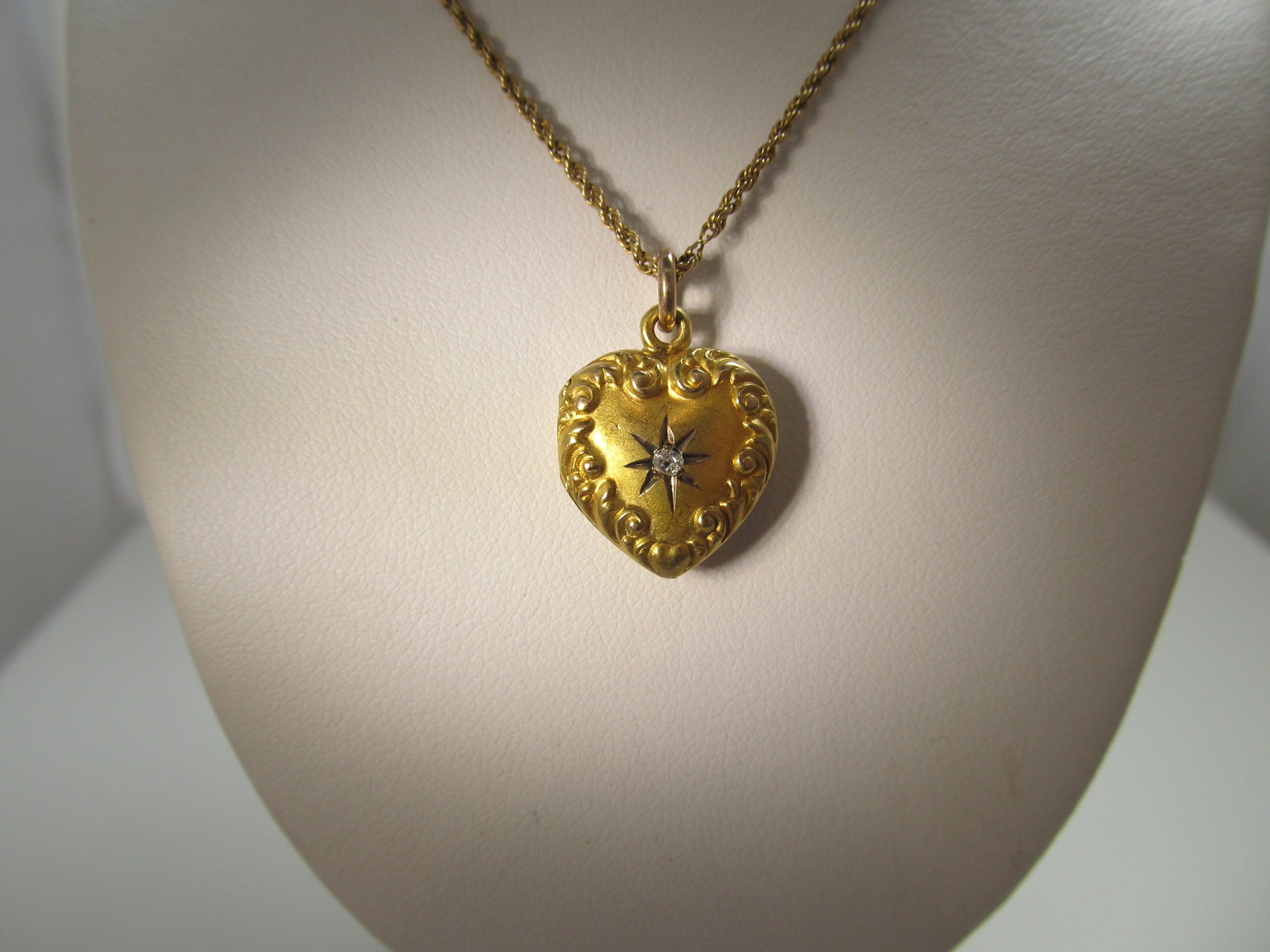 Antique heart shaped diamond locket