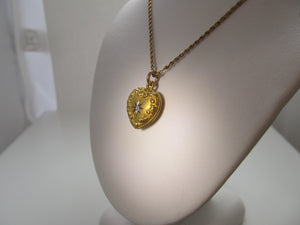 Antique heart shaped diamond locket