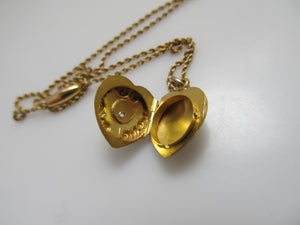 Antique heart shaped diamond locket