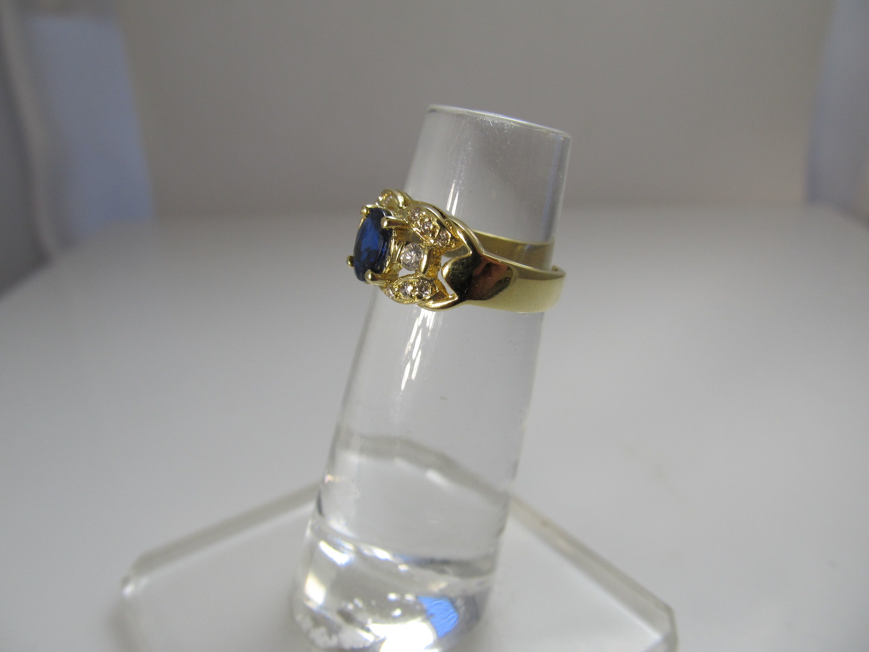 Yellow gold sapphire and diamond ring