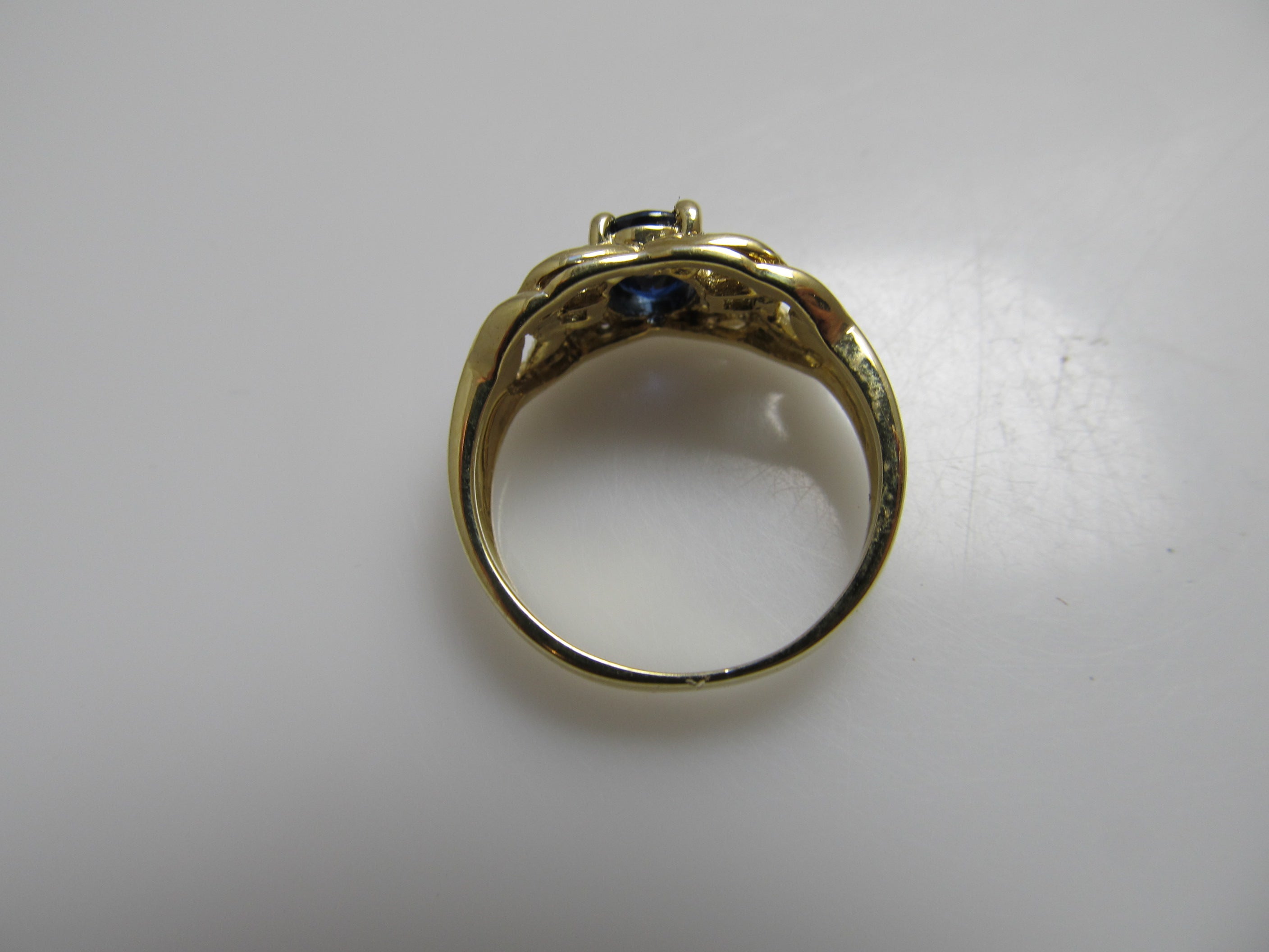 Yellow gold sapphire and diamond ring