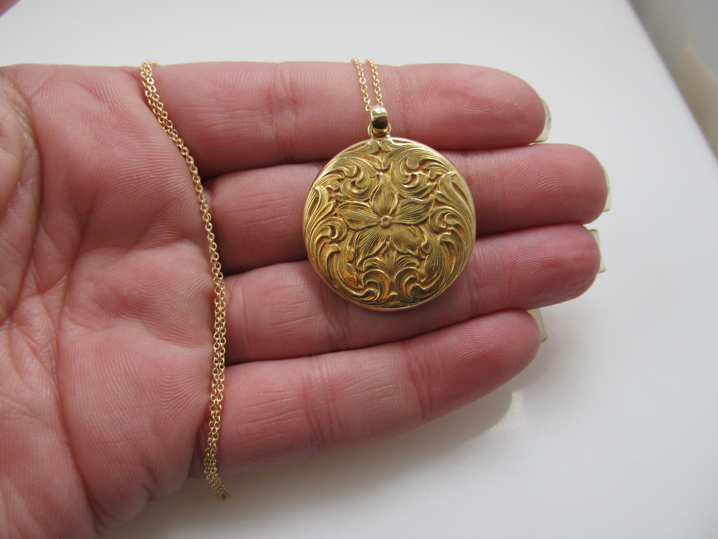 Antique hand engraved flower locket, circa 1900